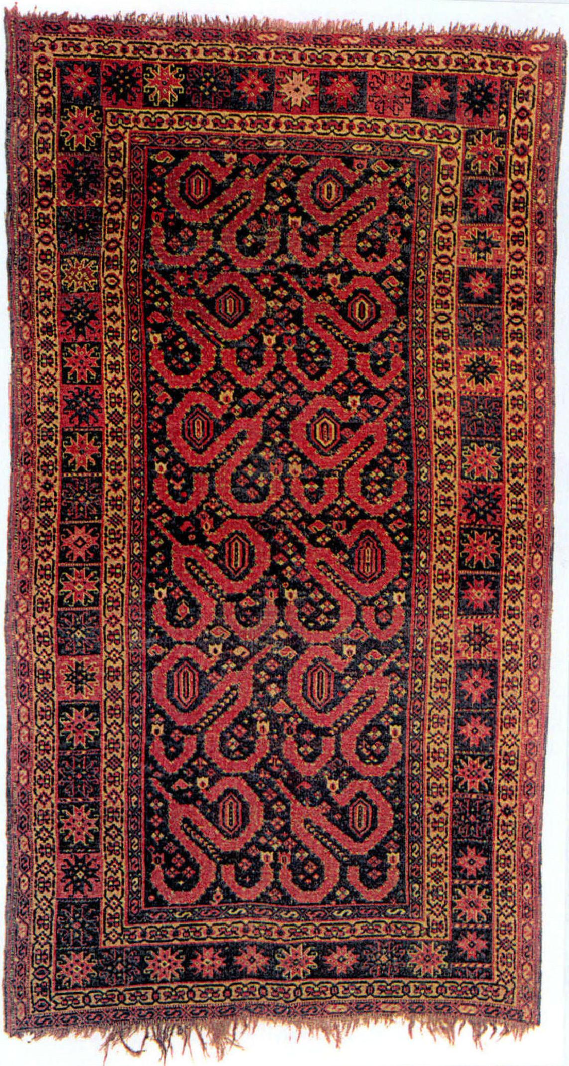 红和深兰色典型的土库曼风格的地毯
